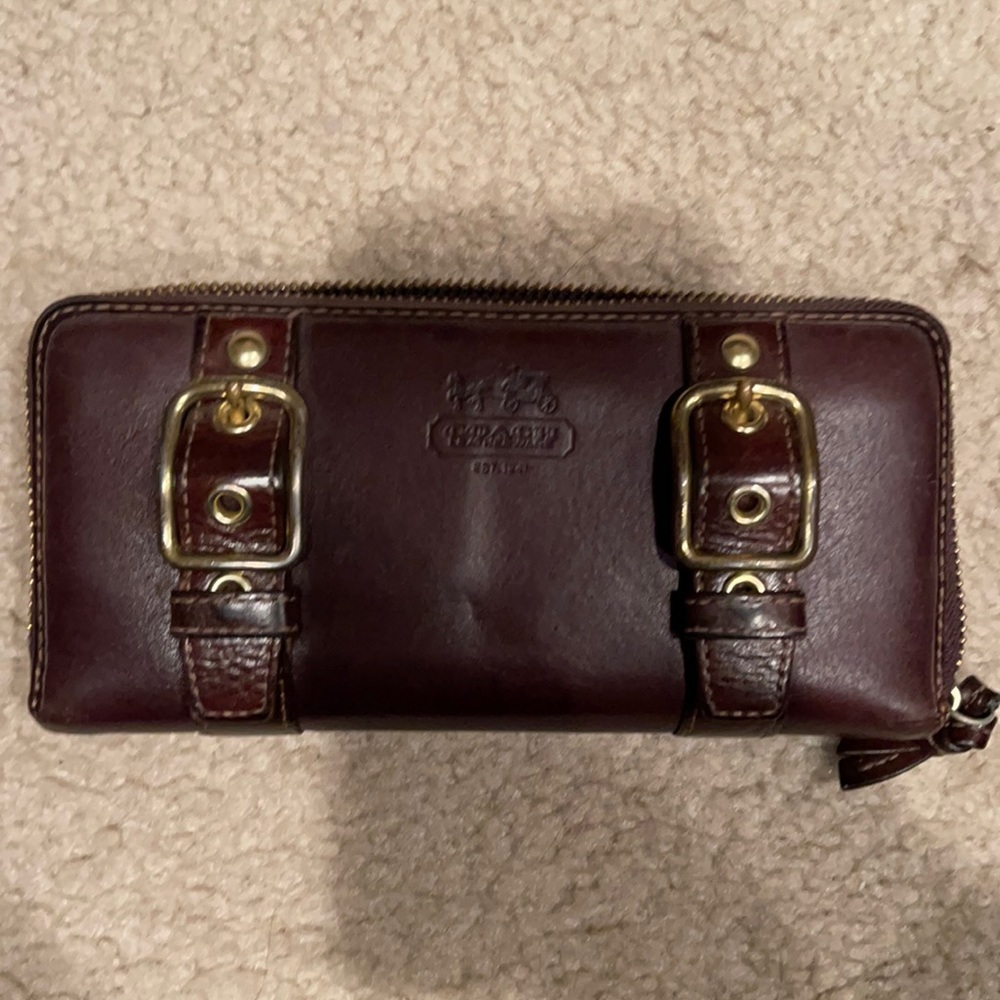Brown Coach wallet gold buckles